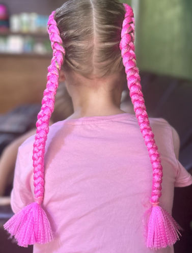 Twin braids with tassel details